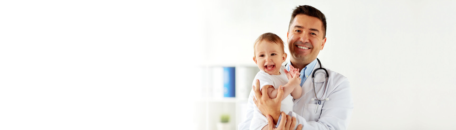 doctor carrying a child